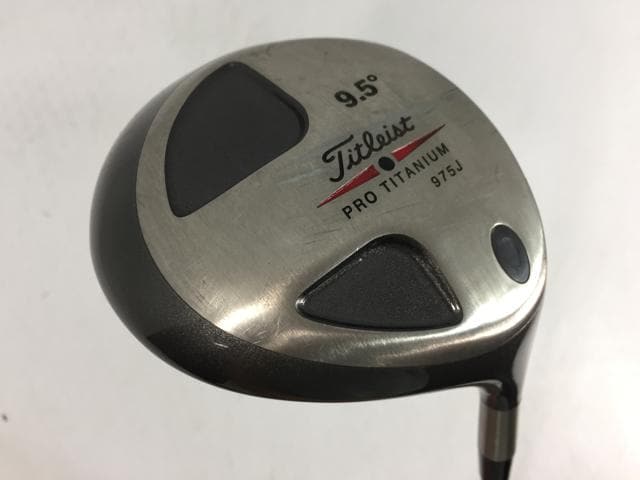 975J`^